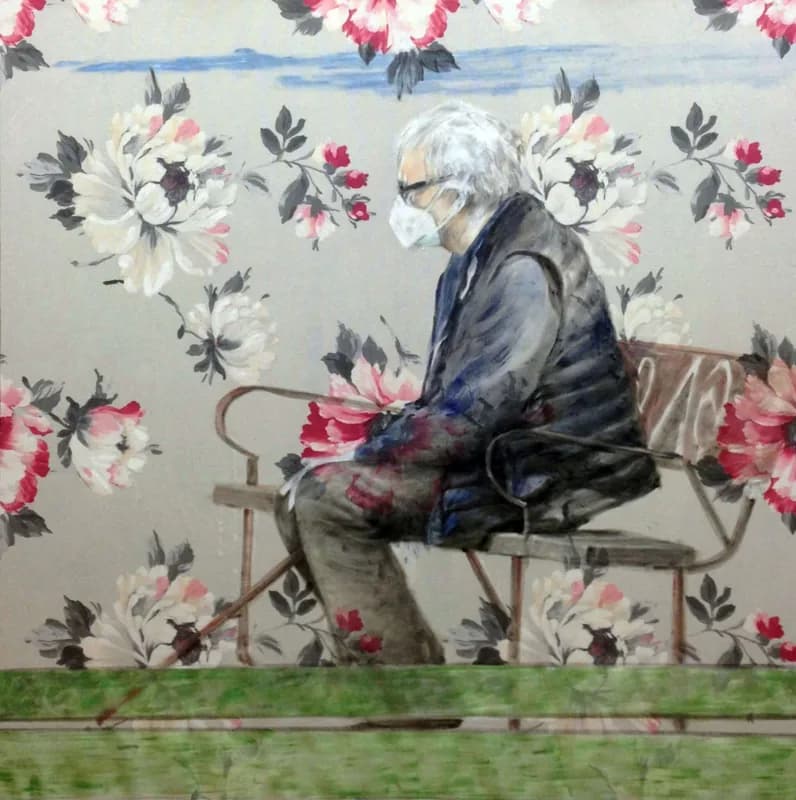 An elderly man with white hair and a face mask sits in profile on a metal bench, with a cane in front of his legs, against a grey background decorated with large white and pink flowers and a green band at the bottom.